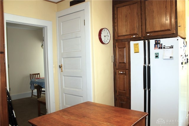 kitchen featuring white refrigerator