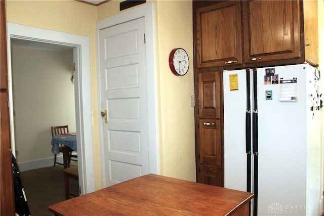 kitchen featuring white fridge