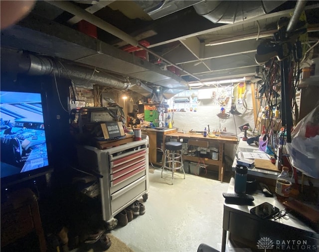 basement featuring a workshop area