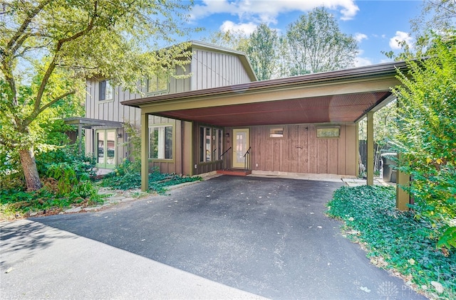 view of front of home featuring a carport