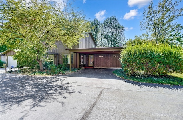 view of front of property with a carport