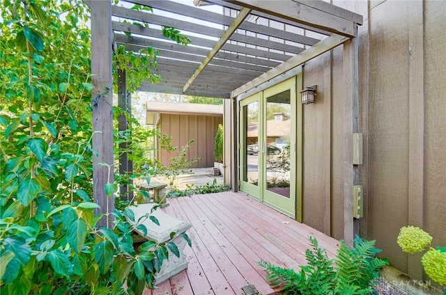 wooden deck featuring a pergola