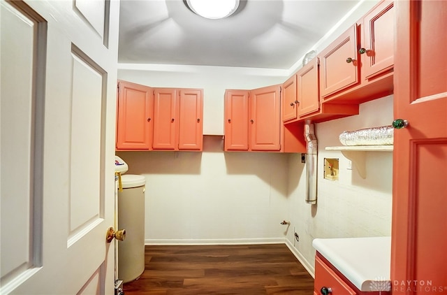 laundry room with cabinets, washer hookup, and dark hardwood / wood-style floors