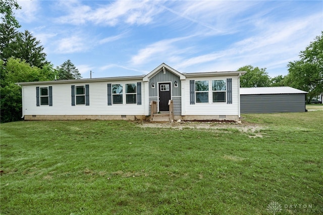 view of front of home with a front lawn