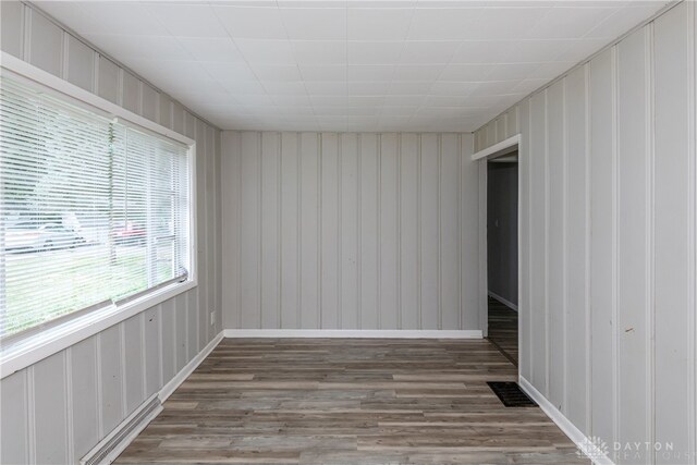 empty room featuring wood-type flooring