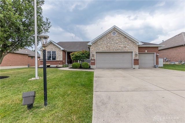 ranch-style house with a garage and a front lawn