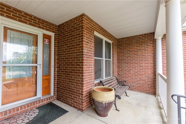 entrance to property with a porch