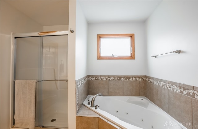 bathroom featuring plus walk in shower