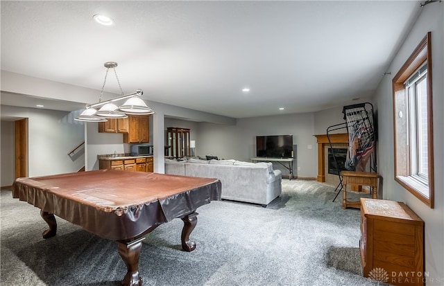 recreation room with a healthy amount of sunlight, pool table, and light colored carpet