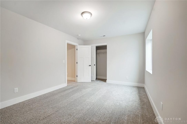 500 Creekside Ln, Lebanon, OH 45036 - unfurnished bedroom with a closet, light colored carpet, and baseboards