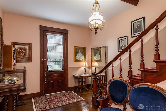 entrance foyer featuring dark hardwood / wood-style floors