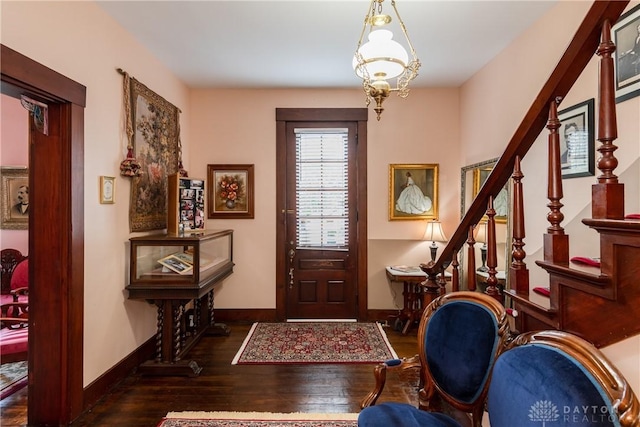 entrance foyer featuring dark wood-type flooring