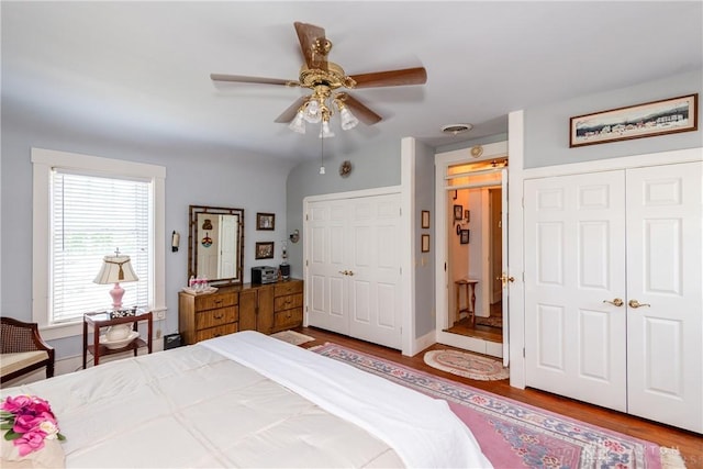 bedroom with ceiling fan, hardwood / wood-style floors, and a closet