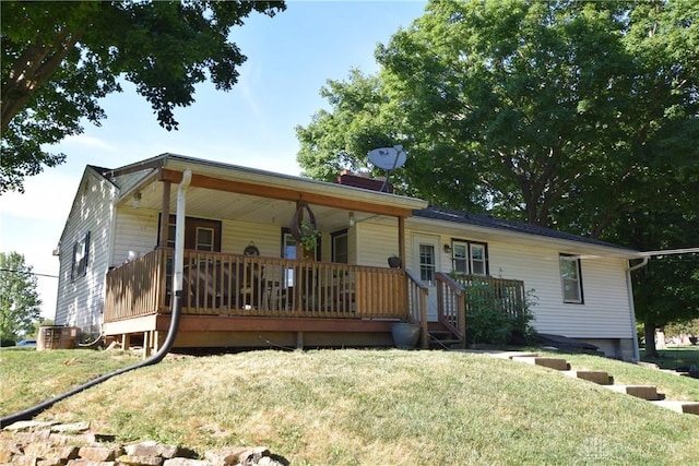 ranch-style home with a front lawn