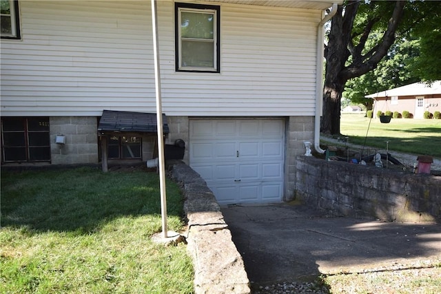 view of property exterior with a lawn and a garage