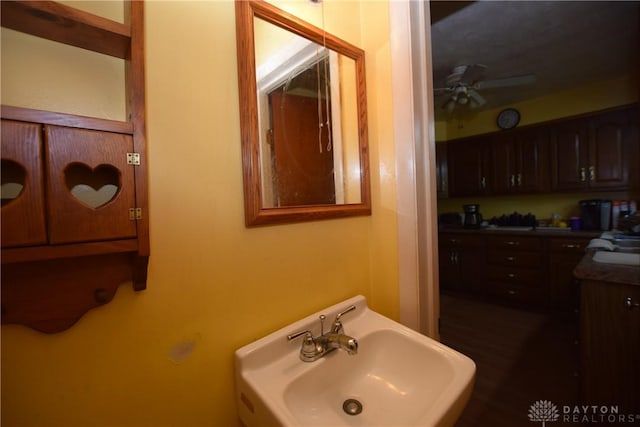 bathroom featuring ceiling fan and sink