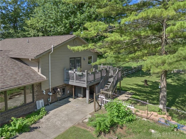 exterior space featuring a yard and a deck