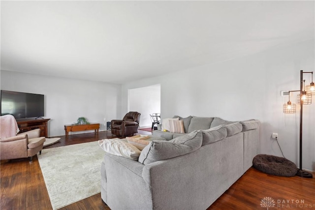 living room featuring dark hardwood / wood-style floors