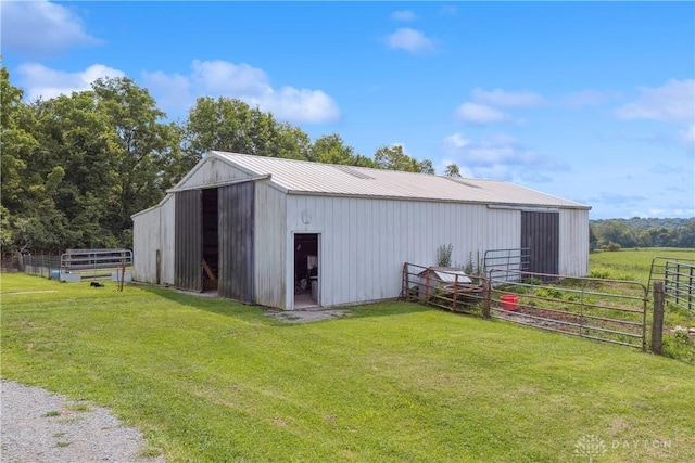 view of outbuilding featuring a rural view