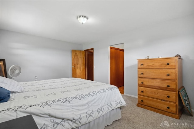 bedroom featuring light colored carpet