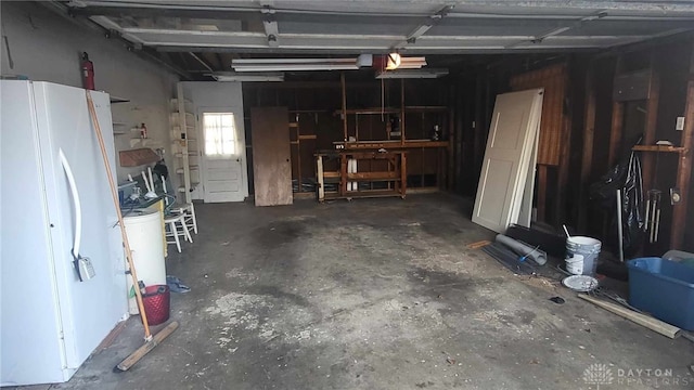 garage featuring white refrigerator