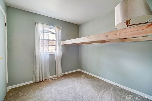 empty room featuring carpet