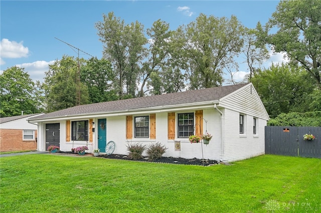 ranch-style home with a front yard