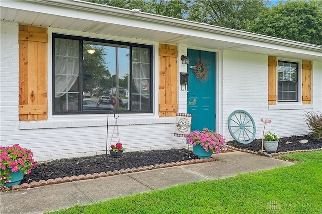 doorway to property with a porch