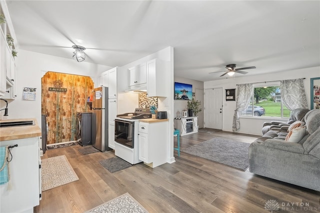 kitchen featuring ceiling fan, white cabinets, white electric range, and hardwood / wood-style floors