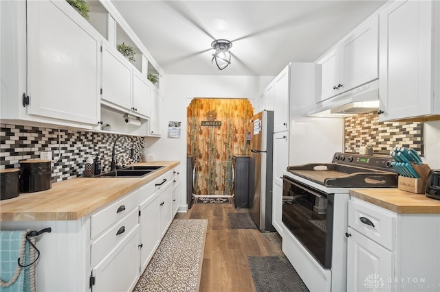 kitchen featuring decorative backsplash, white range with electric stovetop, white cabinets, sink, and stainless steel fridge