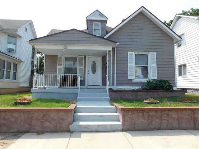 bungalow-style home featuring a porch