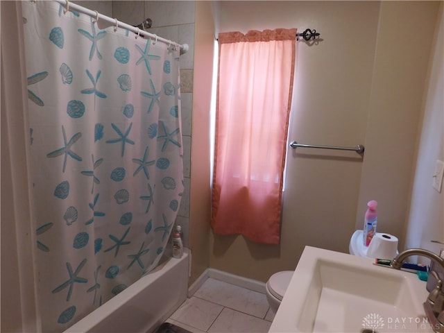 full bathroom with tile patterned flooring, shower / bath combo, toilet, and sink