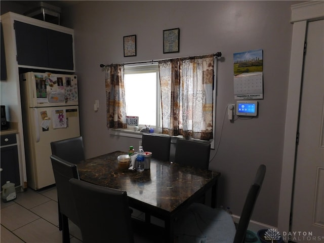 view of tiled dining area