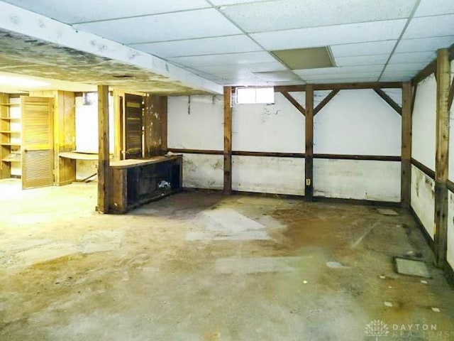 basement with a drop ceiling