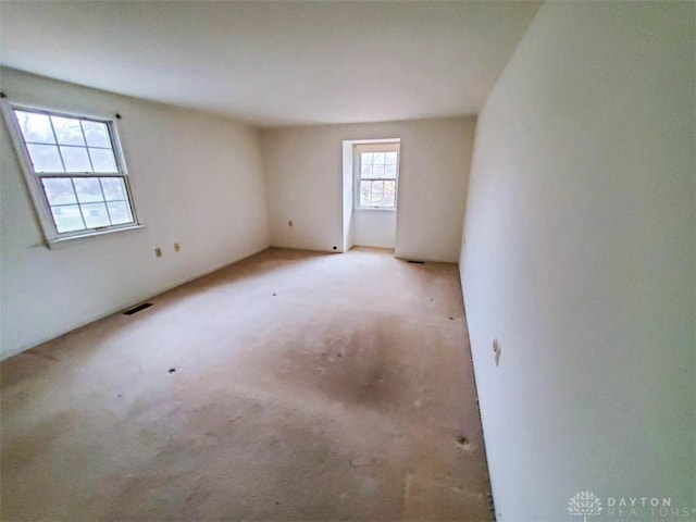 view of carpeted spare room