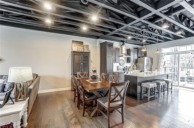 dining area featuring dark hardwood / wood-style flooring