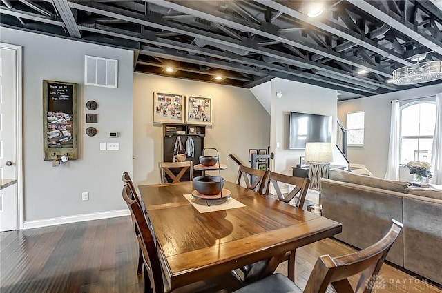 dining room featuring dark hardwood / wood-style floors