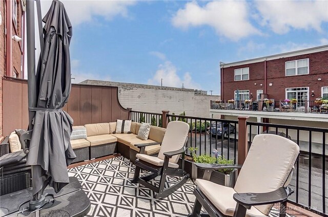 balcony with an outdoor hangout area