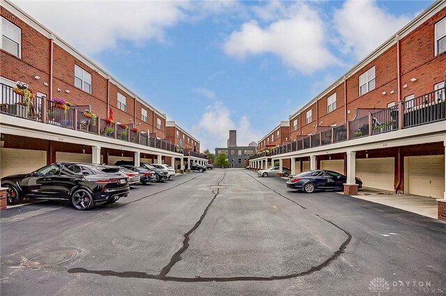 view of parking featuring a garage