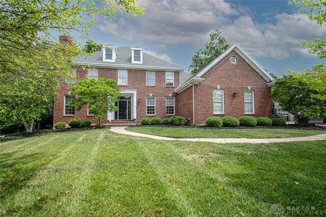 colonial house with a front lawn