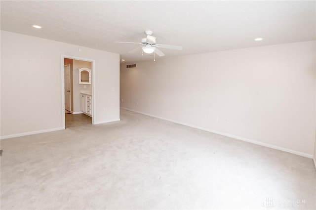 carpeted empty room with ceiling fan