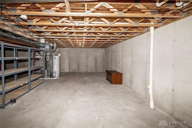 basement featuring water heater