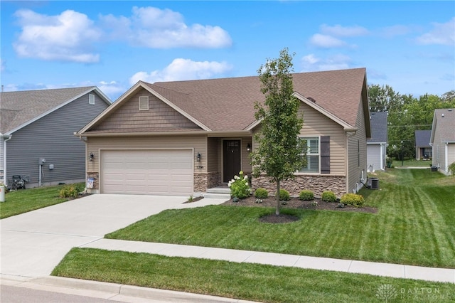 craftsman house featuring a garage, central AC, and a front lawn