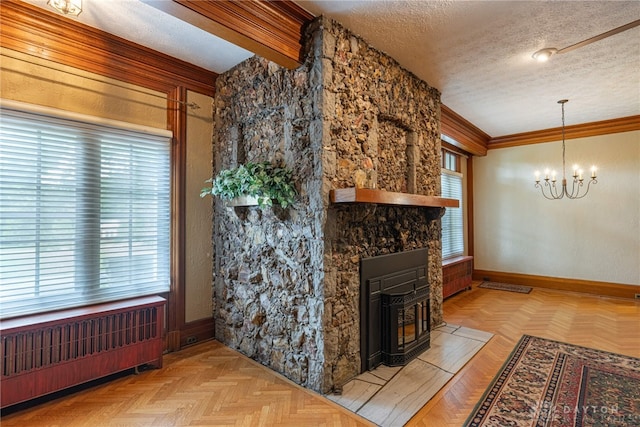 living room with a fireplace, radiator heating unit, a chandelier, light parquet flooring, and a textured ceiling