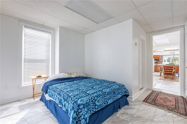 bedroom featuring a drop ceiling