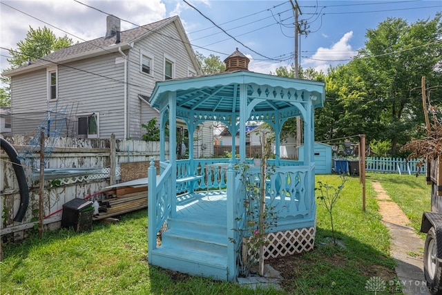 exterior space featuring a yard and a gazebo