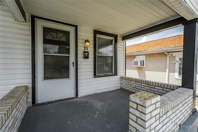 doorway to property featuring a porch