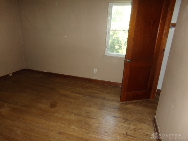 unfurnished room featuring light hardwood / wood-style flooring