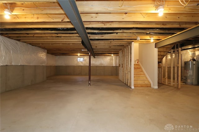 basement featuring gas water heater