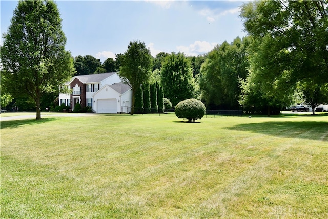 view of yard with a garage